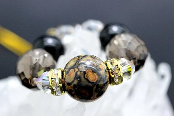 悪縁切り 魔除け ストレスから解放 心身の健康 病気回復 ジャガーの戦士 ストラップ スモーキークォーツ オニキス 天然石 パワーストーン 通販 ジュ・オーヴの画像