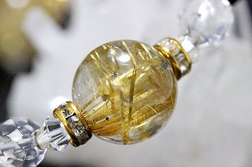 壮麗！金運 仕事運 ギャンブル運 くじ運アップ 魔除けブレスレット ゴールドルチルクォーツ＆ゴールドブラウンルチルクォーツ 大玉入り 天然石 パワーストーンの画像