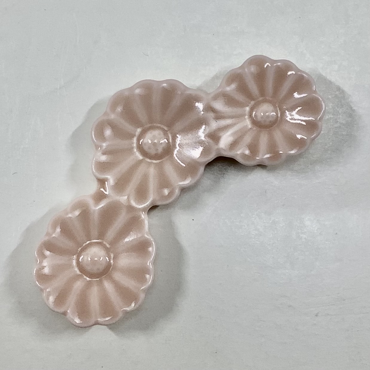 曙釉菊形箸置の画像
