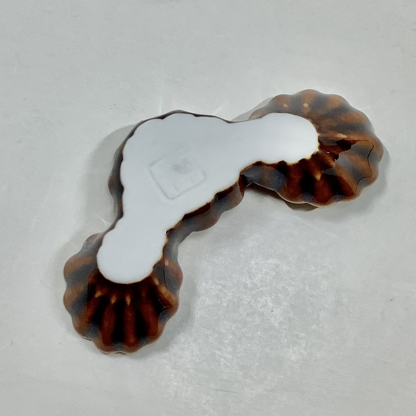 べっ甲釉菊形箸置の画像