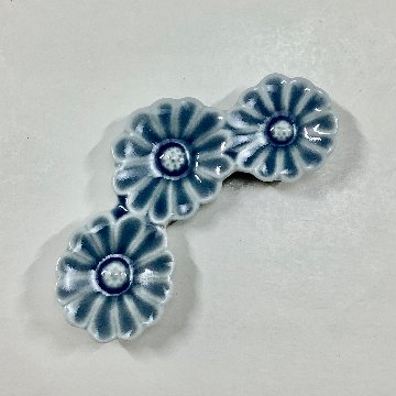 青鈍釉菊形箸置の画像