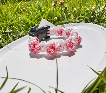 【肉球の防災ブレスレット】⑥白×ペールピンクの肉球の画像