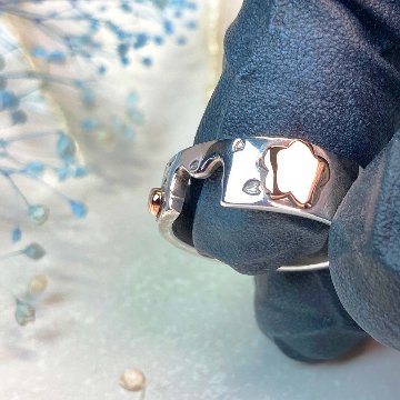春の世界を旅する猫リング｜重ねて完成するペアリング（桜とハート・シルバー925・18金カスタム可）の画像