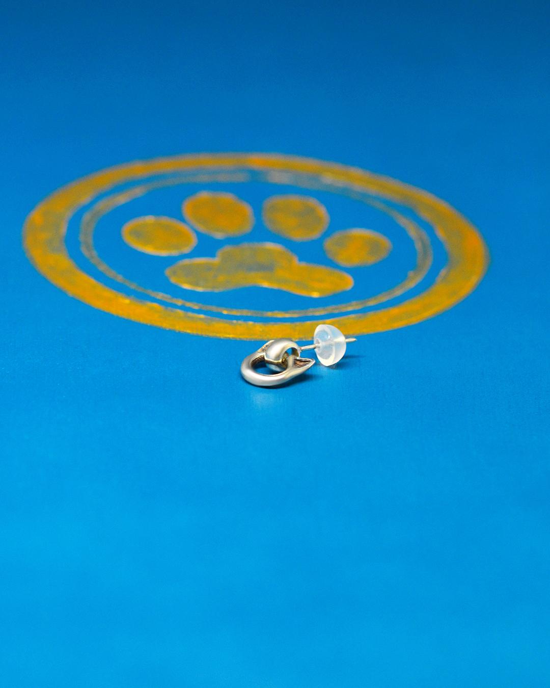 輪っかねこのピアスの画像