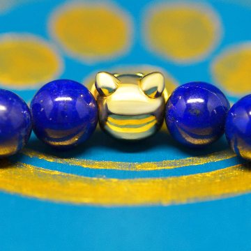 18金の８mm猫顔と8mmラピスラズリ（濃い色セレクト）の画像
