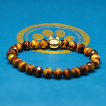 10ｍｍの猫顔(18金）と８mm多面カットタイガーアイのブレスレットの画像