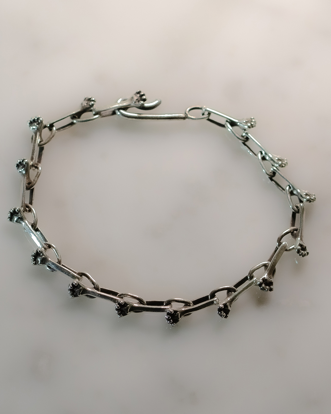 猫の手付きチェーンブレスレットsv925の画像