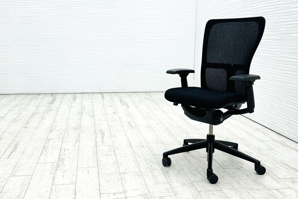 ヘイワース ゾディチェア 中古 HAWORTH ゾディ 上下可動肘 中古オフィス家具 ブラック系の画像